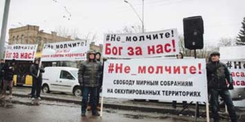 Мирний протест християн проти дій окупаційної влади у Криму перед Посольством РФ вразив поліцію та солдат Нацгвардії